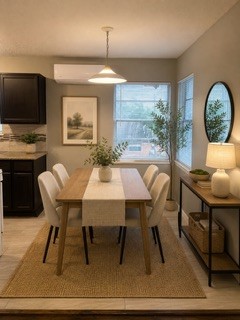 5418 Weaver Road, Unit D Houston, TX 77016 - Photo 8 of 10 a dining room with furniture and window