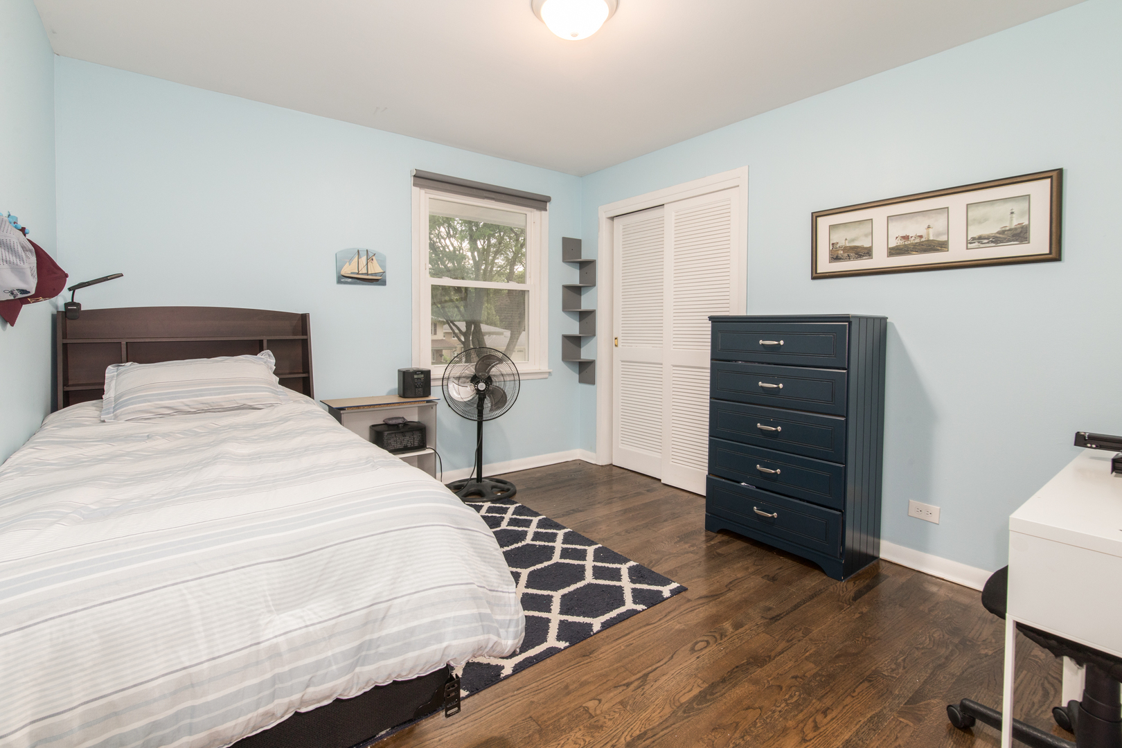 2005 Cayuga Lane Mount Prospect, IL 60056 - Photo 17 of 28 a bedroom with a bed and a window