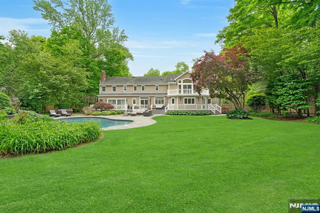 48 Hopper Farm Road Upper Saddle River, NJ 07458 - Photo 37 of 43 a view of house with a big yard