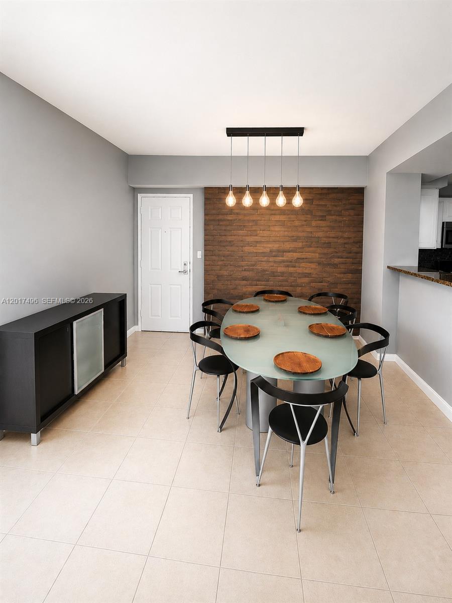 Brickell Miami, FL 33131 - Photo 2 of 19 a outdoor dining space with furniture and window