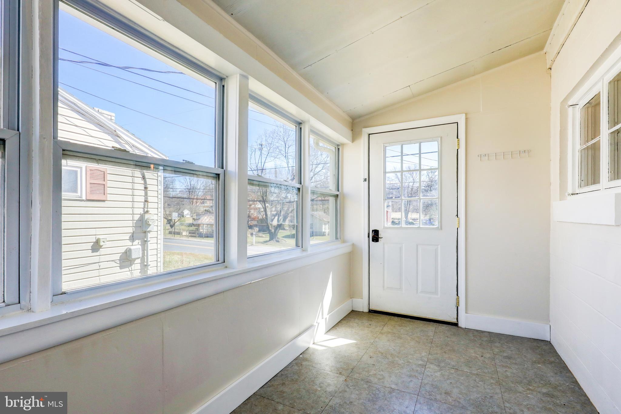 215 Akron Road Ephrata, PA 17522 - Photo 17 of 24 a view of an empty room with a window