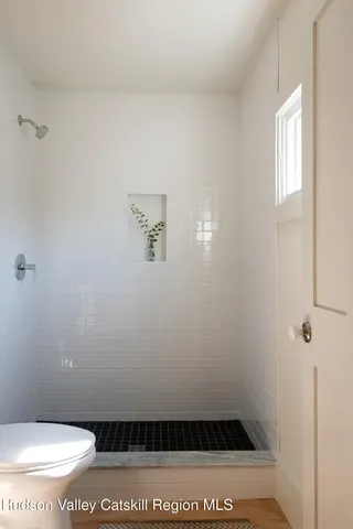 a bathroom with a toilet