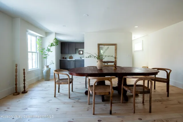 a view of a dining room with furniture