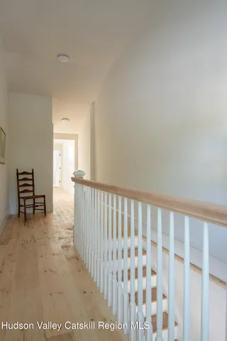 a view of hallway with livingroom