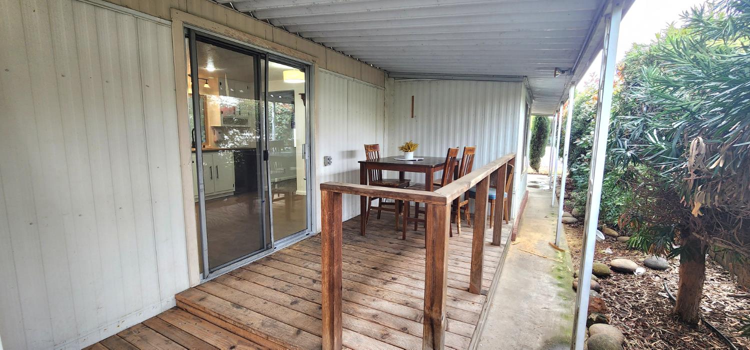 1300 West Olson Avenue, Unit 179 Reedley, CA 93654 - Photo 17 of 39 a view of living room kitchen and entryway