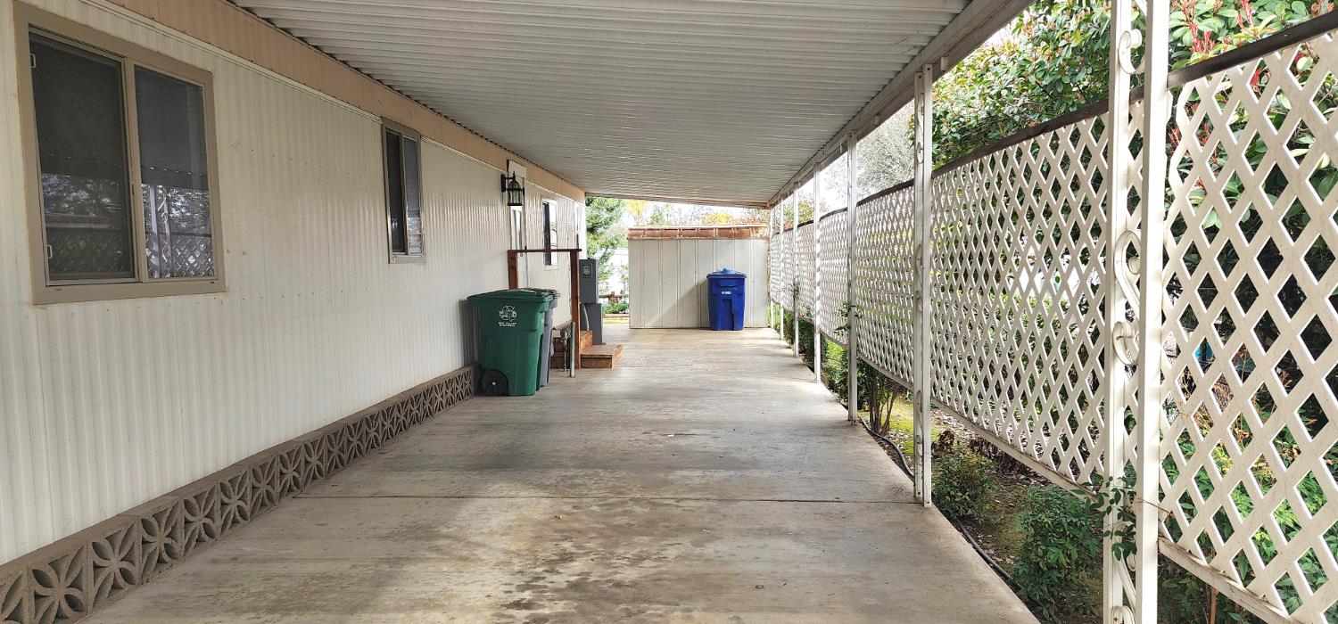 1300 West Olson Avenue, Unit 179 Reedley, CA 93654 - Photo 6 of 39 a view of a back yard from a balcony