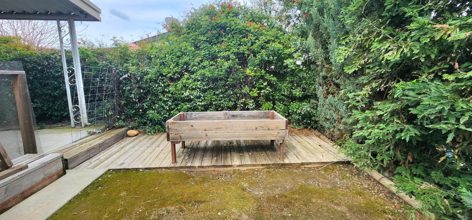 1300 West Olson Avenue, Unit 179 Reedley, CA 93654 - Photo 9 of 39 a view of a backyard with swimming pool