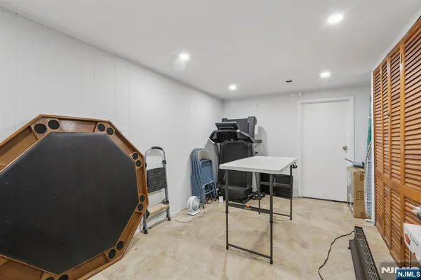 a view of a hallway with workspace