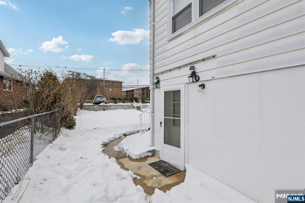 10 Millo Place, Unit 1 Little Ferry, NJ 07643 - Photo 36 of 42 a view of a terrace with wooden floor