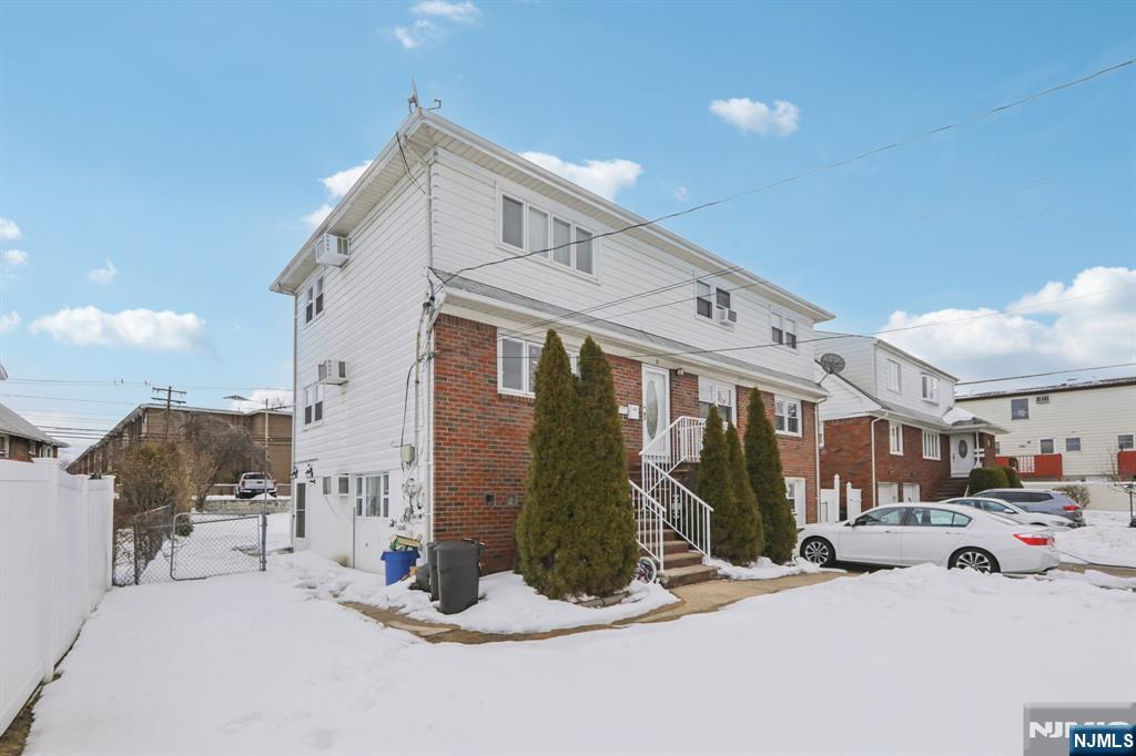 10 Millo Place, Unit 1 Little Ferry, NJ 07643 - Photo 4 of 42 a view of a building with sitting area