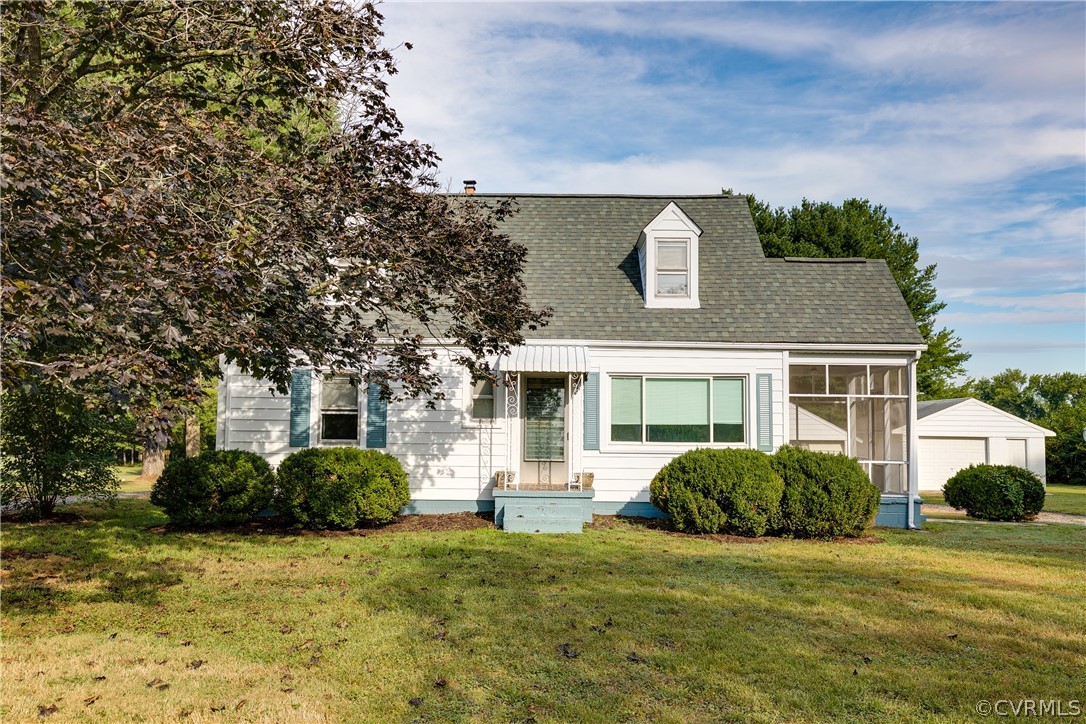 20404 Anderson Mill Road Beaverdam, VA 23015 - Photo 1 of 40 a front view of a house with a garden