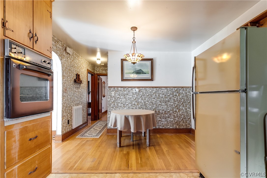 20404 Anderson Mill Road Beaverdam, VA 23015 - Photo 15 of 40 a dining room with furniture and a wooden floor