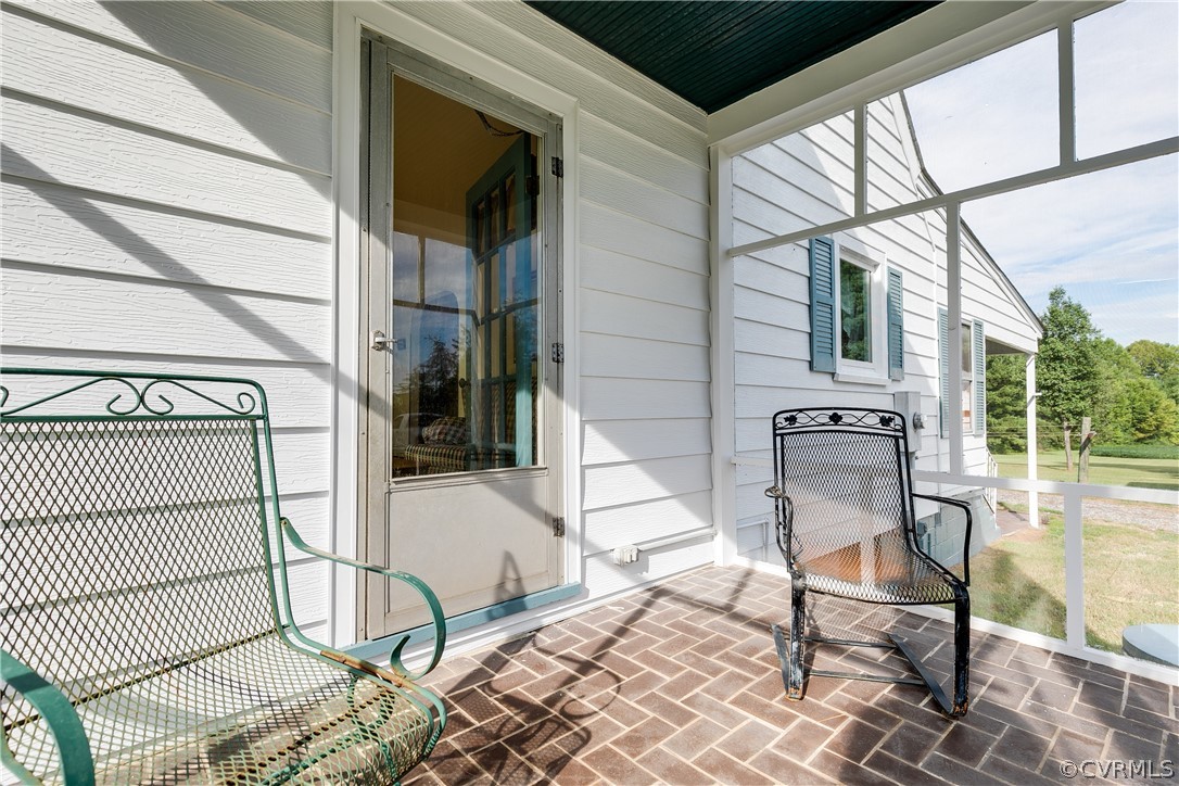 20404 Anderson Mill Road Beaverdam, VA 23015 - Photo 28 of 40 a view of a chairs and table in the balcony