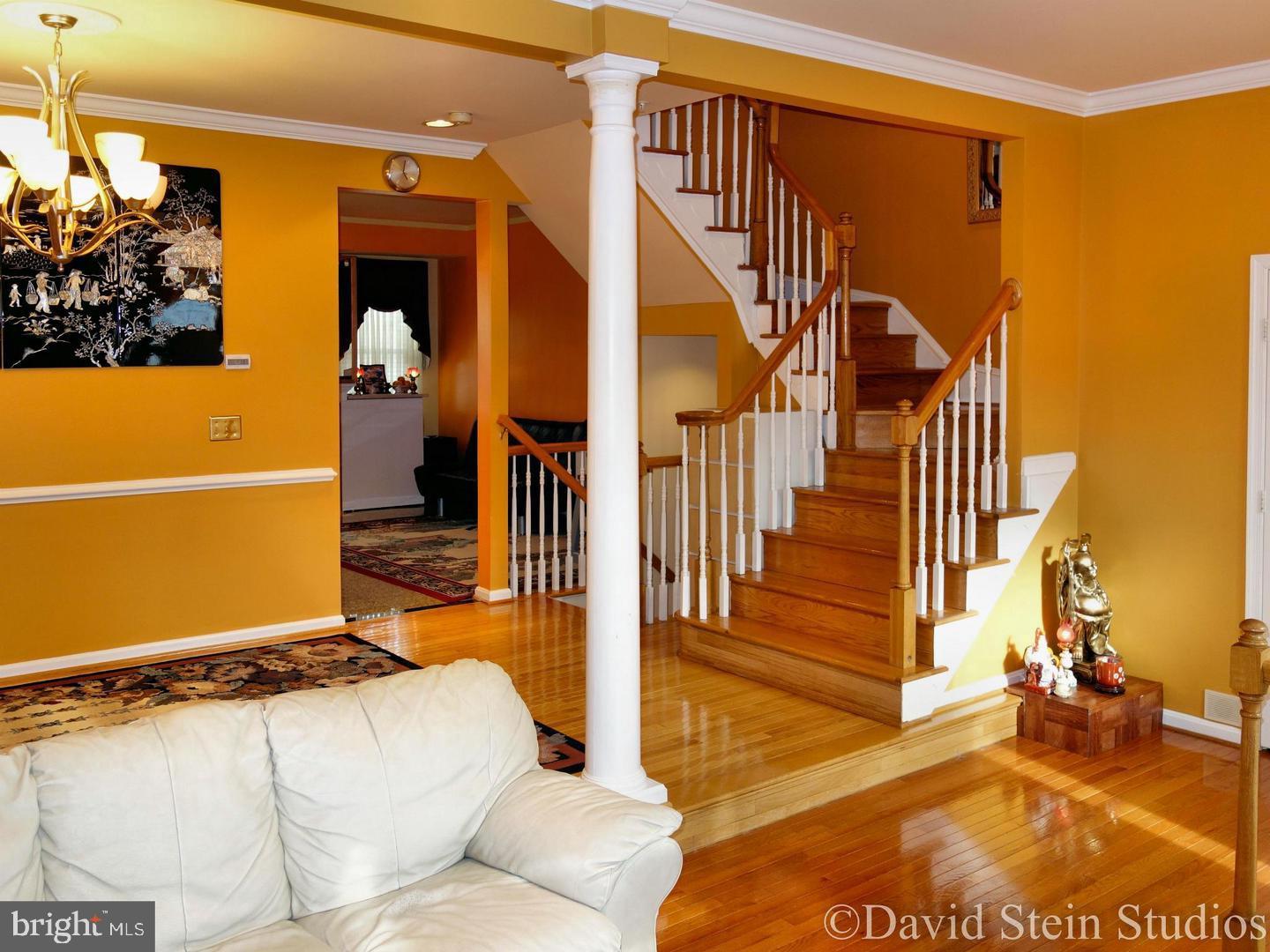 14119 Red Eagle Lane Silver Spring, MD 20906 - Photo 4 of 4 a view of a livingroom with furniture and staircase