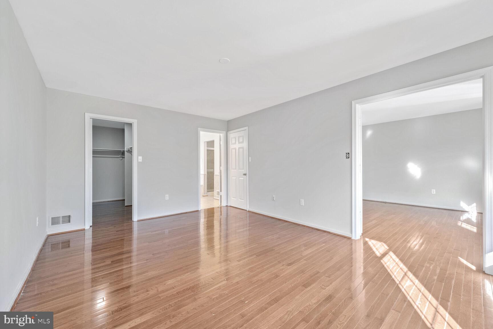 501 Dobbin Court Accokeek, MD 20607 - Photo 18 of 38 a view of an empty room and wooden floor