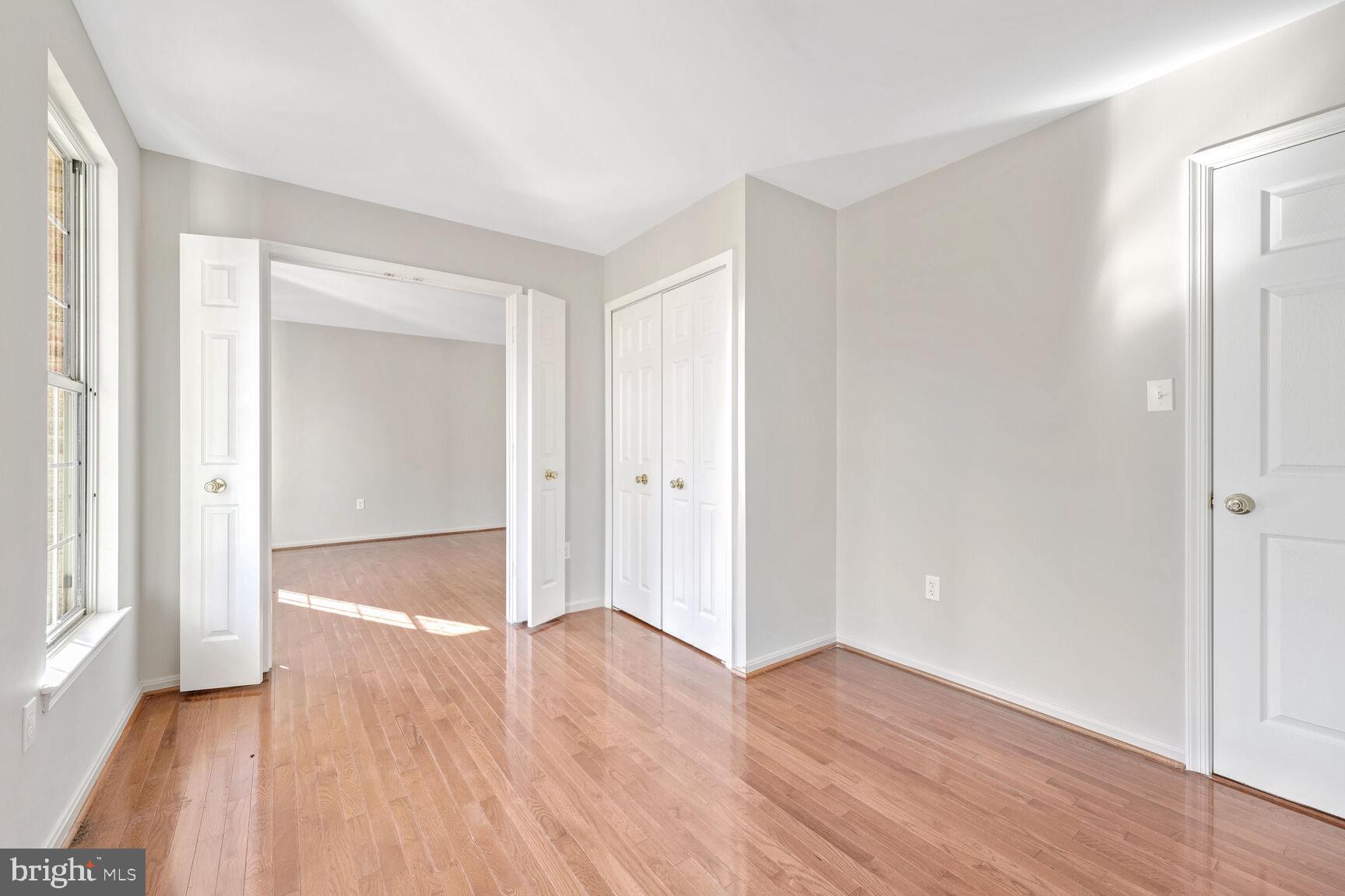501 Dobbin Court Accokeek, MD 20607 - Photo 21 of 38 a view of an empty room with wooden floor