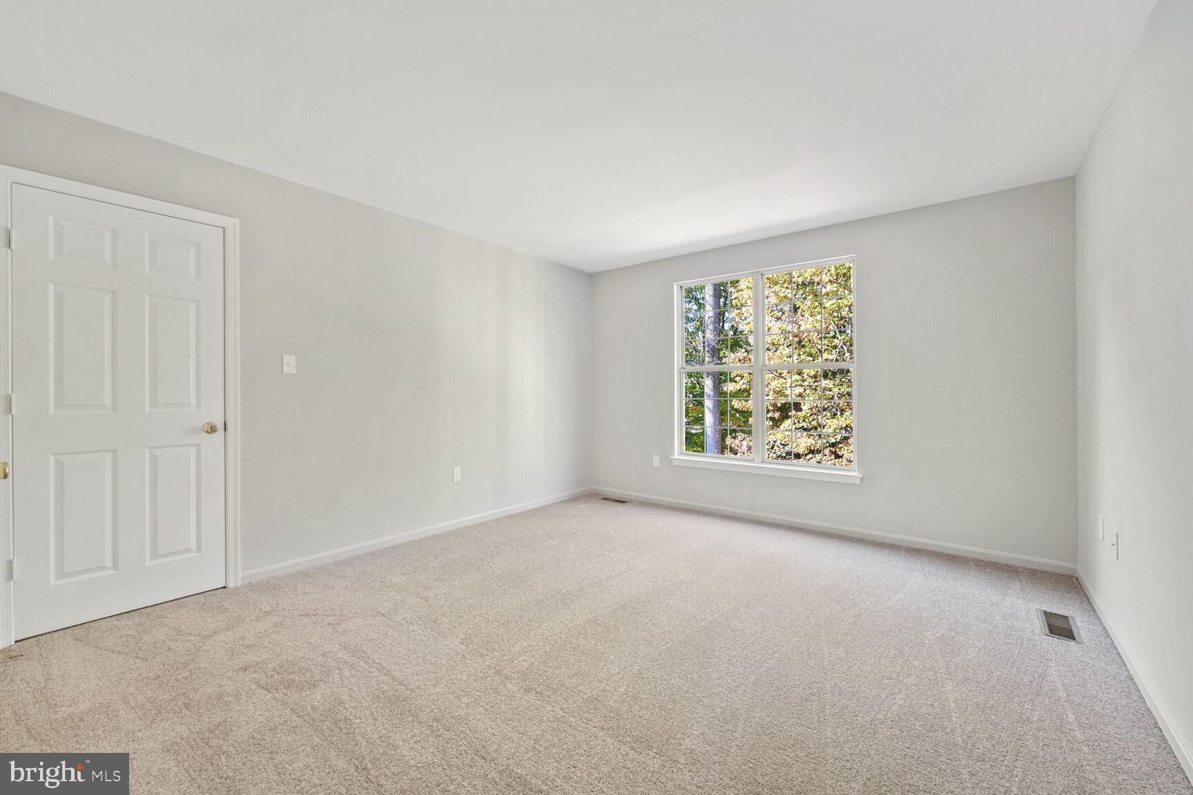 501 Dobbin Court Accokeek, MD 20607 - Photo 25 of 38 an empty room with windows