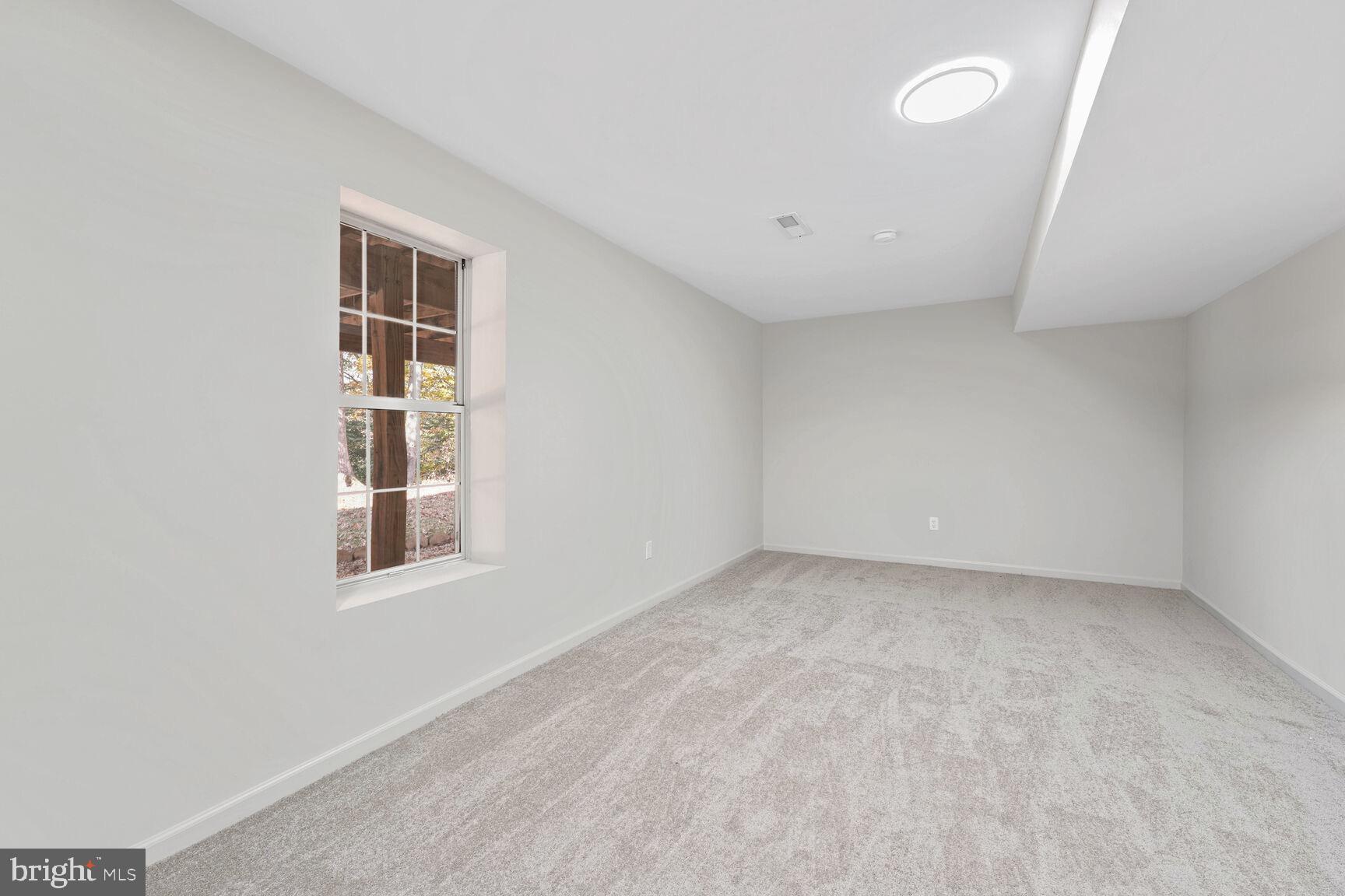 501 Dobbin Court Accokeek, MD 20607 - Photo 28 of 38 an empty room with windows