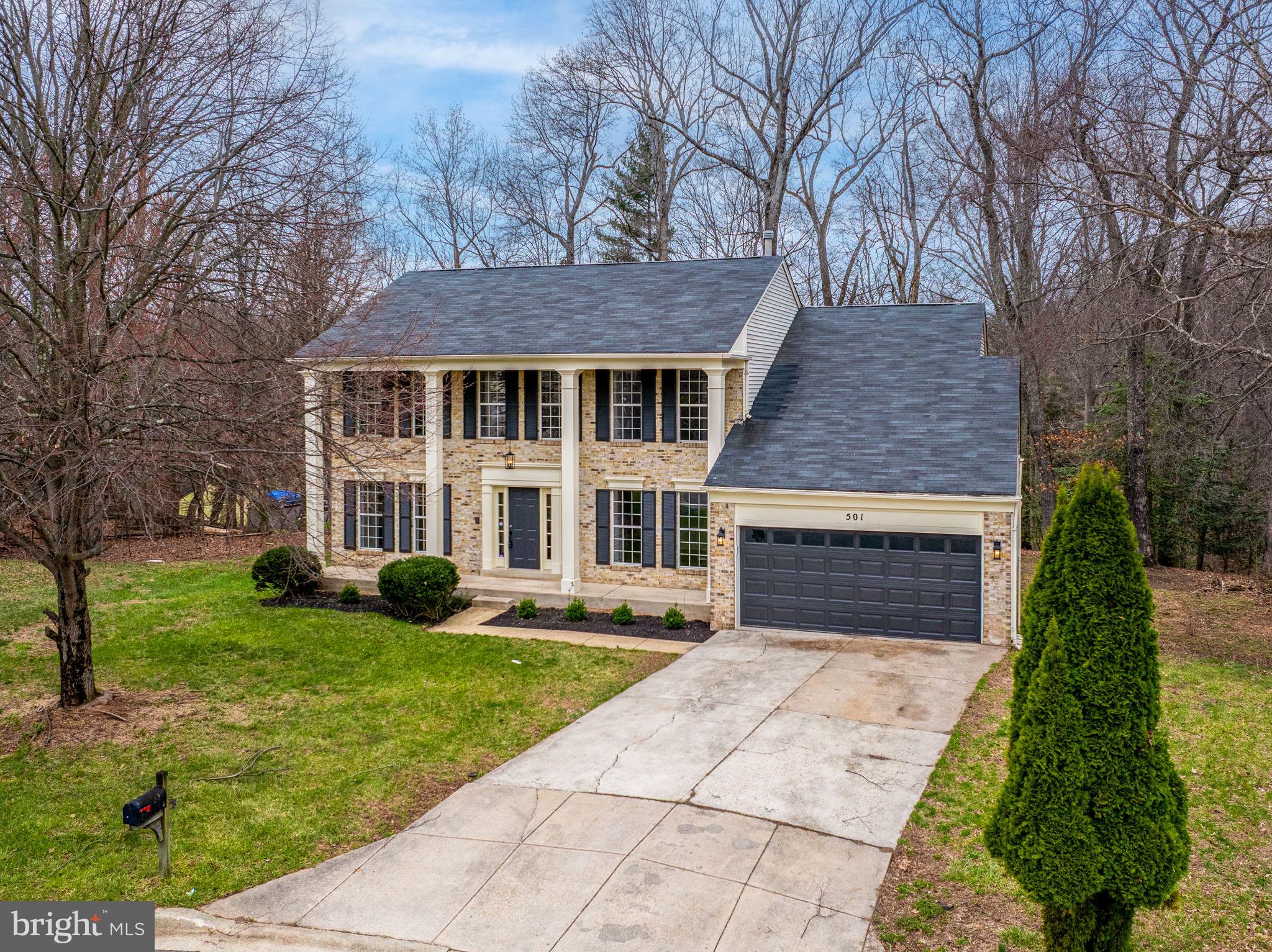 501 Dobbin Court Accokeek, MD 20607 - Photo 32 of 38 front view of a house with a yard