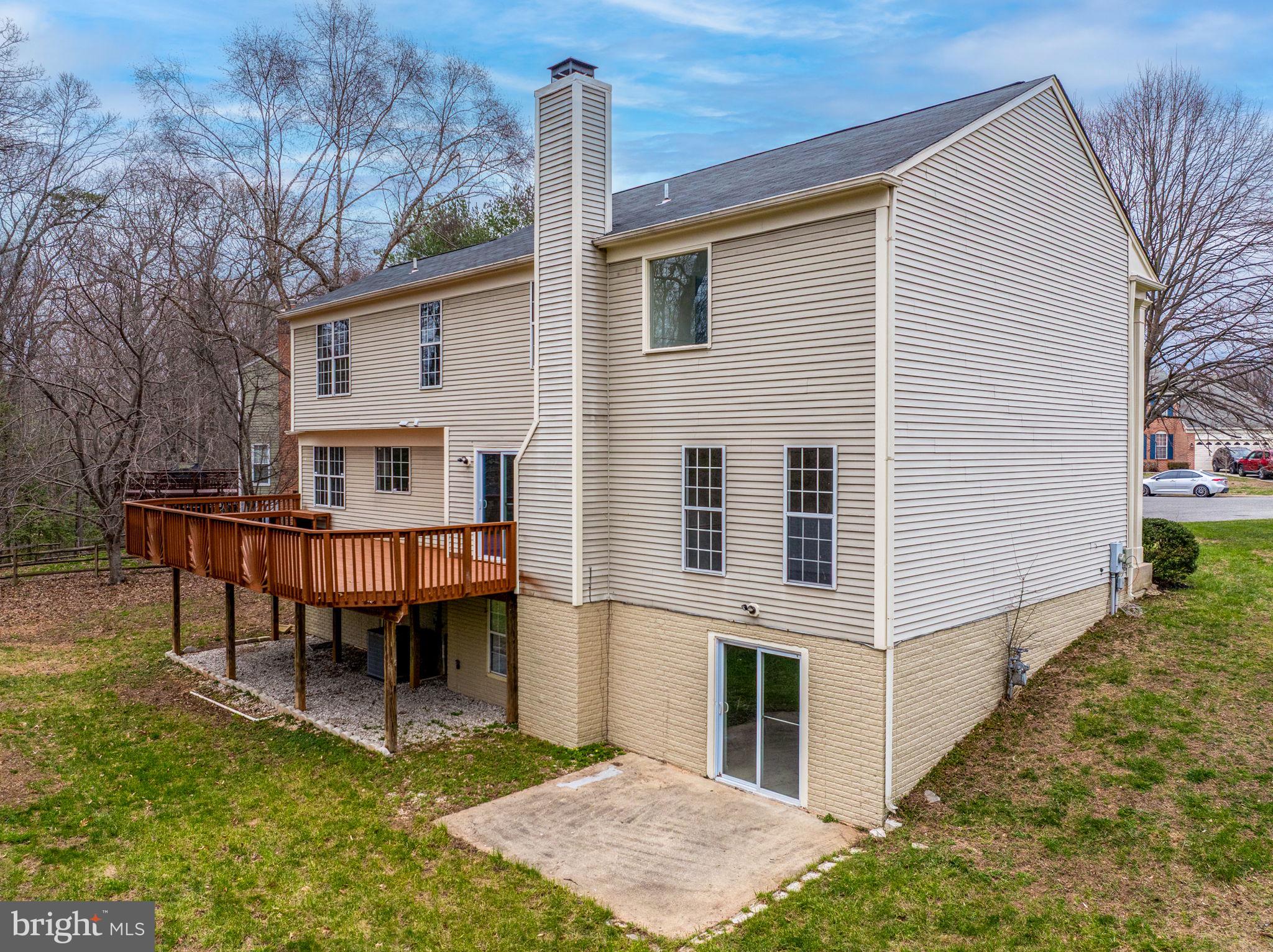 501 Dobbin Court Accokeek, MD 20607 - Photo 38 of 38 a view of a house with backyard and sitting area