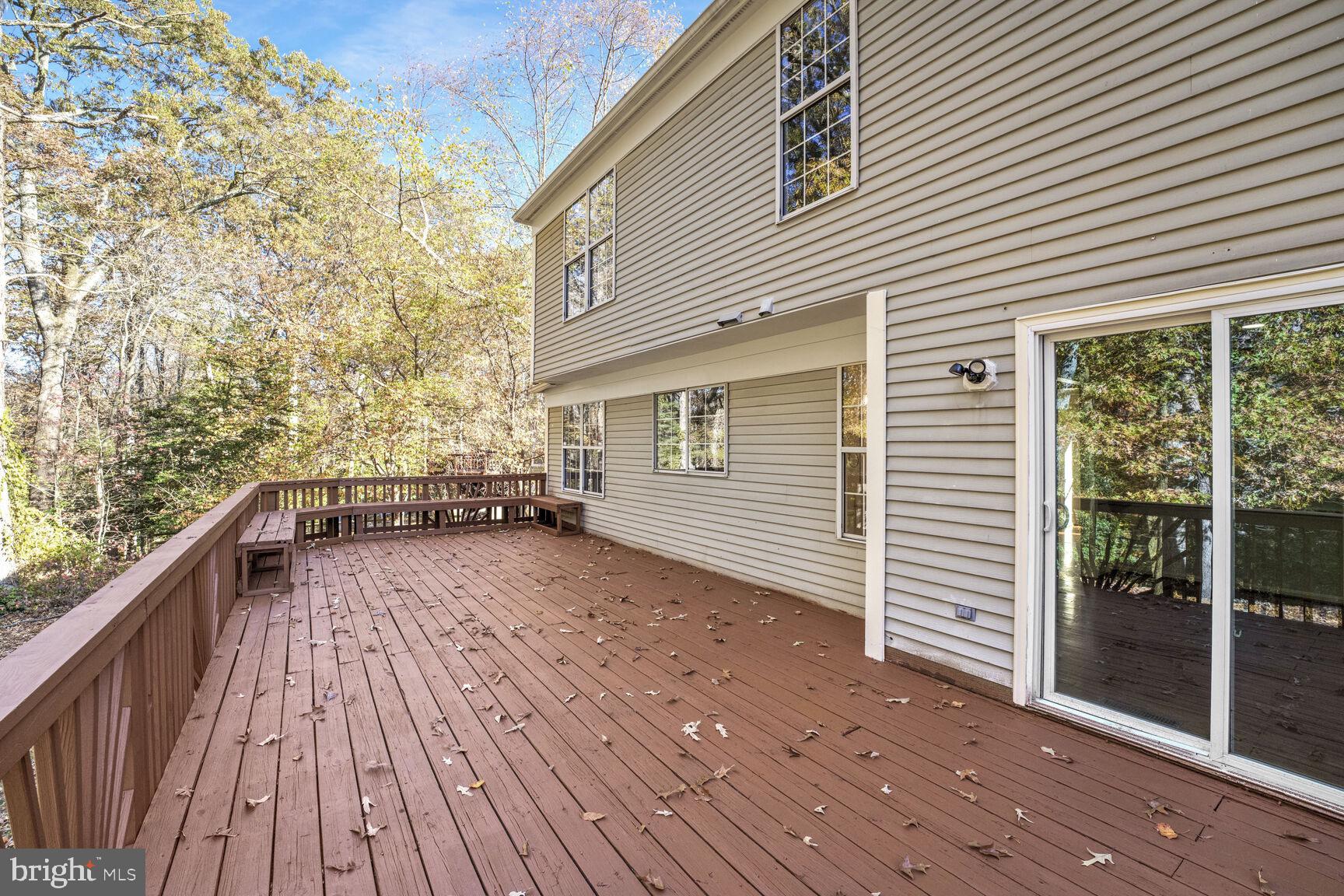501 Dobbin Court Accokeek, MD 20607 - Photo 9 of 38 a view of a balcony with wooden floor and floor