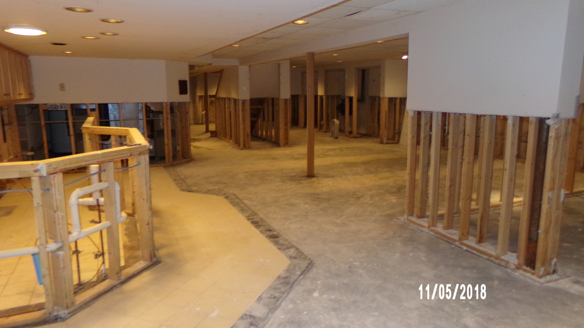 41 Spring Lane Barrington, IL 60010 - Photo 16 of 16 a view of a hallway with wooden walls