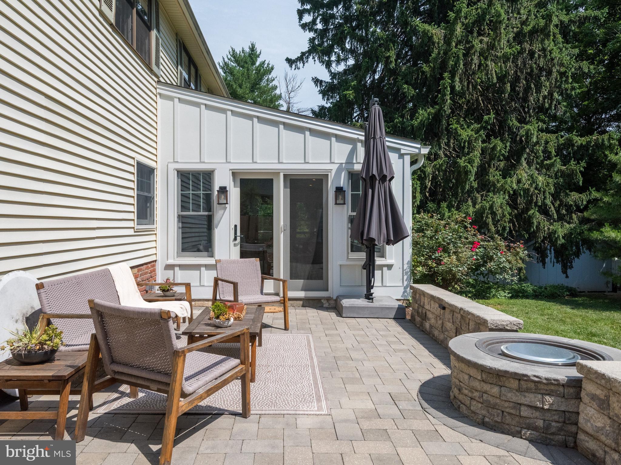 2 Porteous Road Berwyn, PA 19312 - Photo 31 of 38 Paver patio with built in firepit