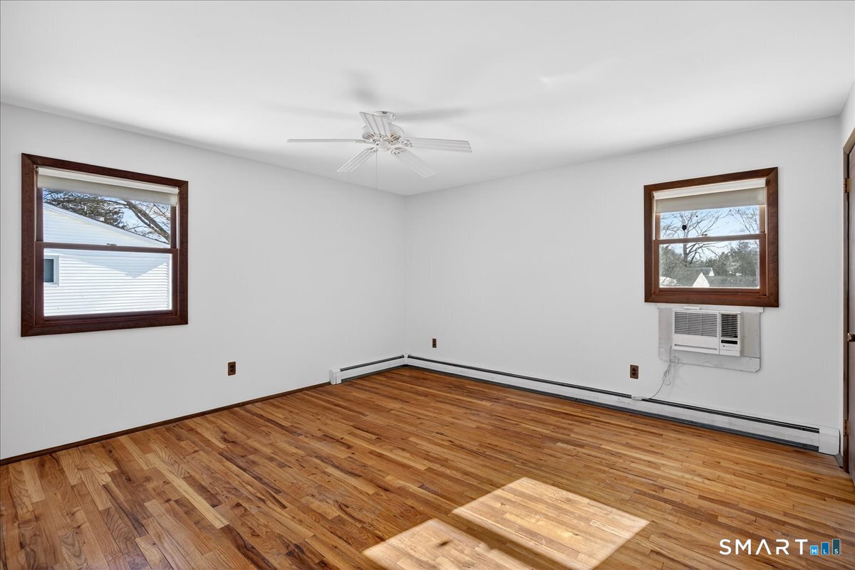 80 Flower Drive Hamden, CT 06518 - Photo 11 of 28 a view of an empty room with a window