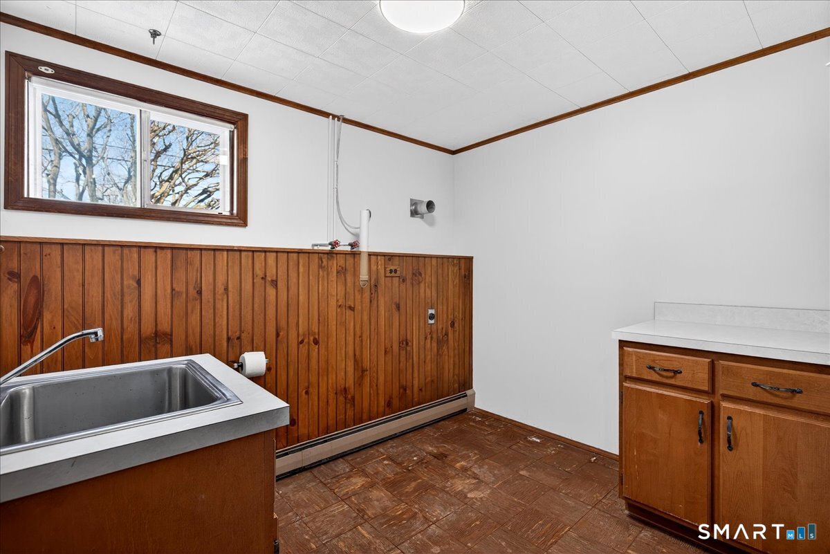 80 Flower Drive Hamden, CT 06518 - Photo 21 of 28 a view of a storage & utility room with a sink