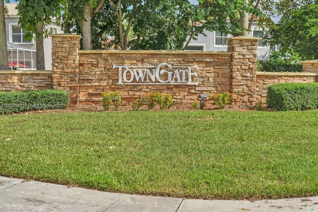 an aerial view of a house with a lake view