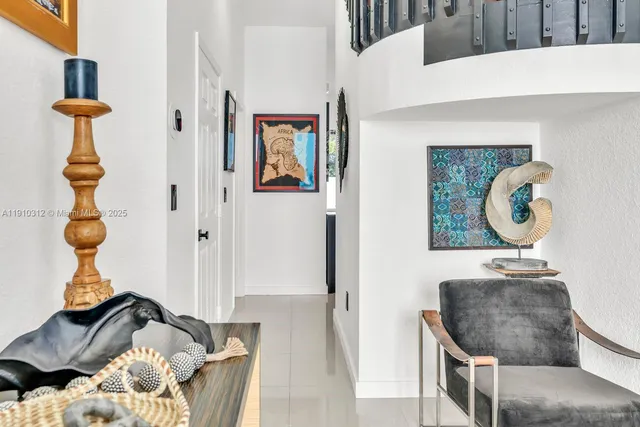 a view of kitchen with stainless steel appliances refrigerator oven and kitchen island