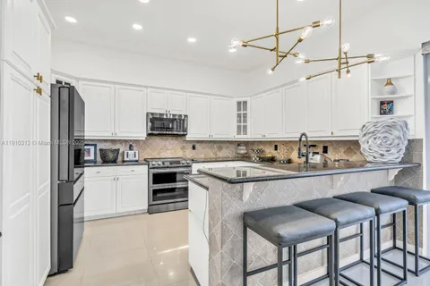 $975,000 | 15697 Northwest 12th Place, Pembroke Pines, FL 33028