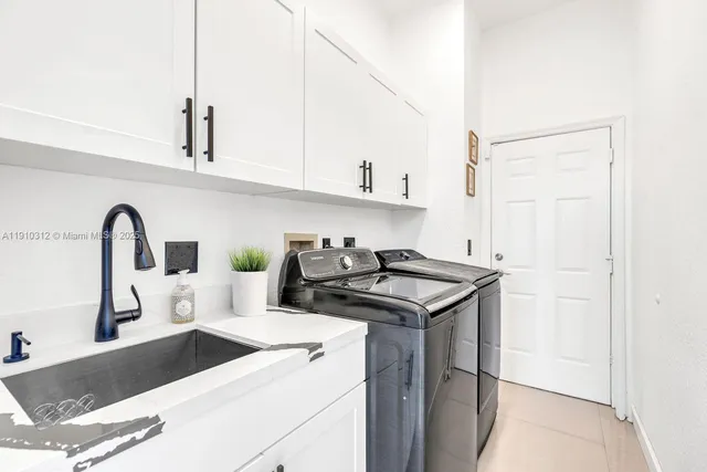 a view of livingroom with furniture and refrigerator