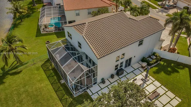 $975,000 | 15697 Northwest 12th Place, Pembroke Pines, FL 33028