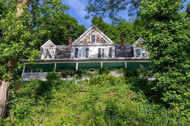 a house view with a garden space