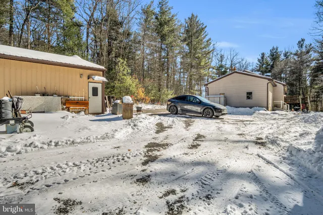 a view of a covered with snow in the background
