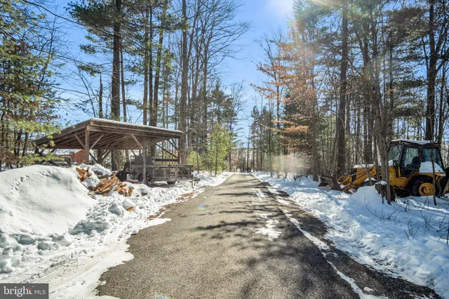 a view of a backyard of the house