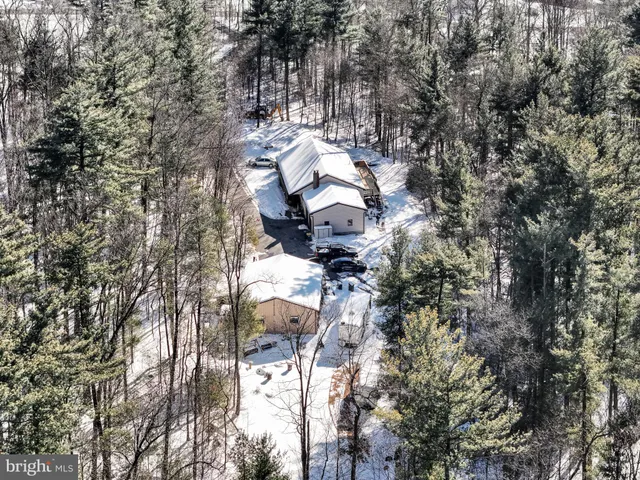 a view of a house with a tree