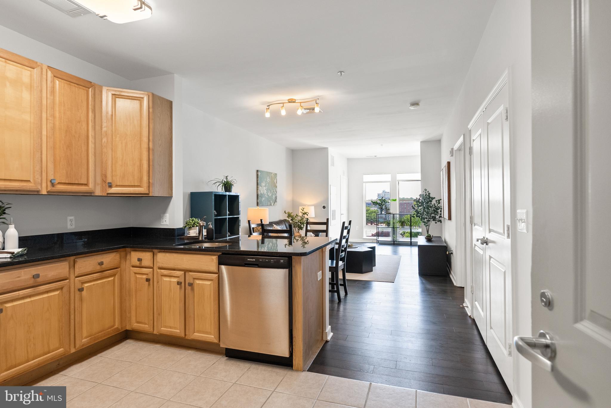 8045 Newell Street, Unit 512 Silver Spring, MD 20910 - Photo 13 of 49 Enter the bright & open living space