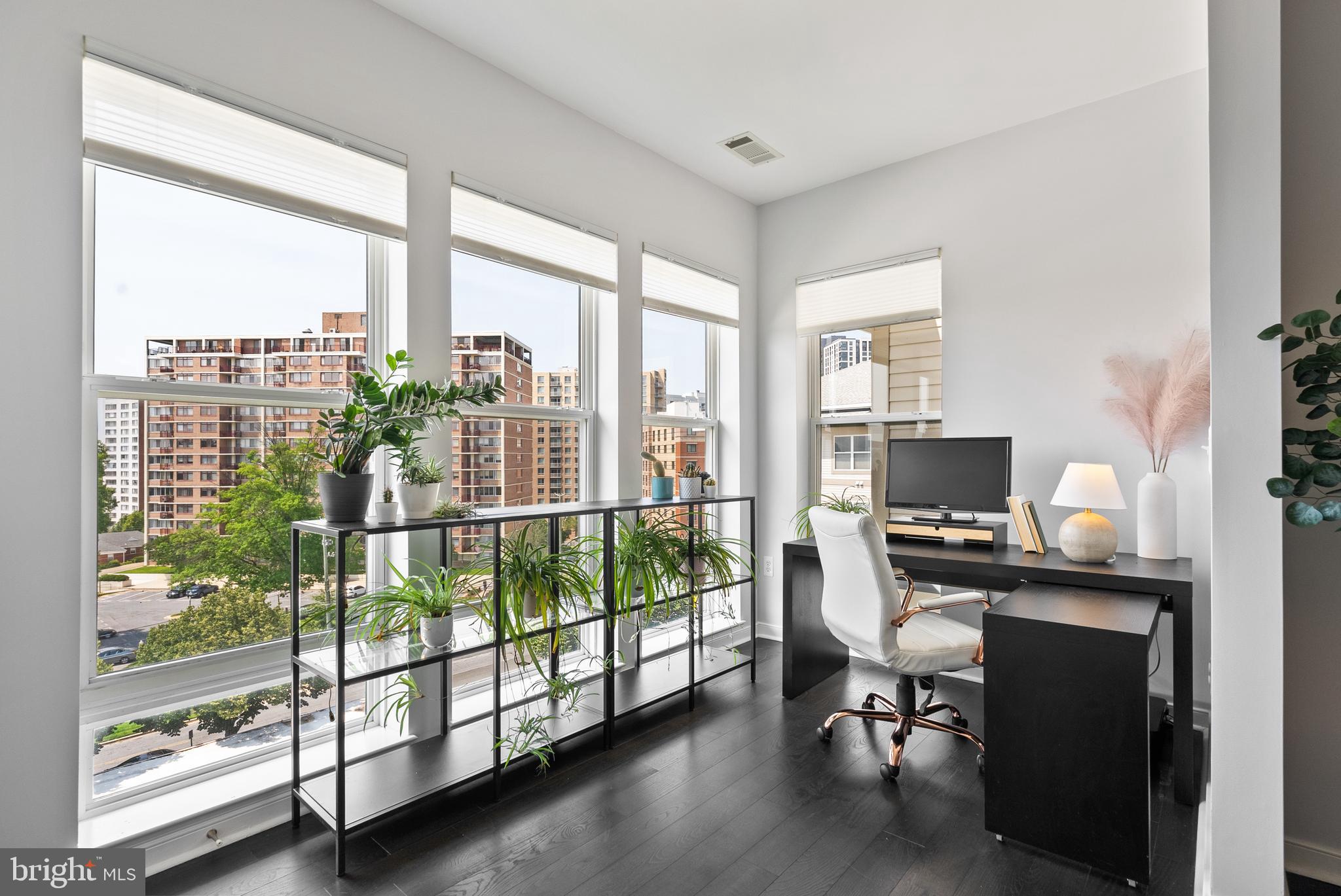 8045 Newell Street, Unit 512 Silver Spring, MD 20910 - Photo 25 of 49 Floor-to-ceiling windows and extra high ceilings