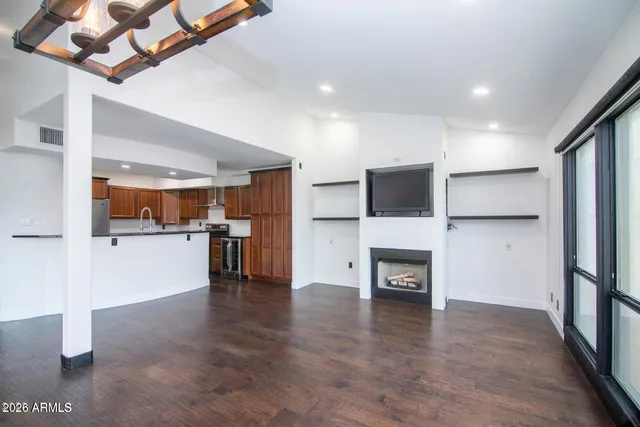 a view of kitchen with wooden floor