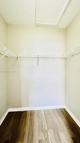 a view of an empty walk in closet