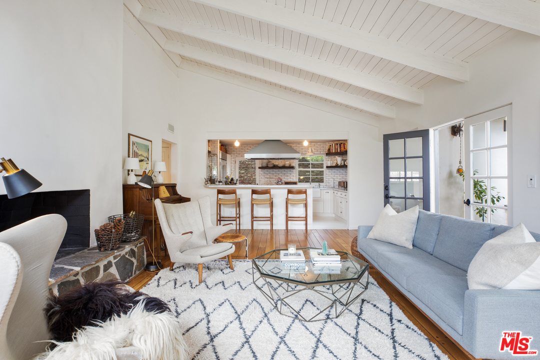 558 East Channel Road Santa Monica, CA 90402 - Photo 11 of 34 a living room with furniture and wooden floor