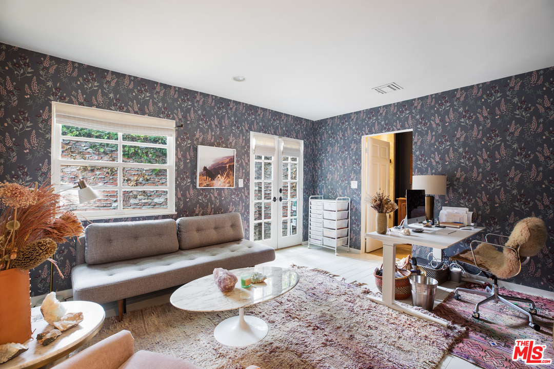 558 East Channel Road Santa Monica, CA 90402 - Photo 16 of 34 a living room with furniture and a large window