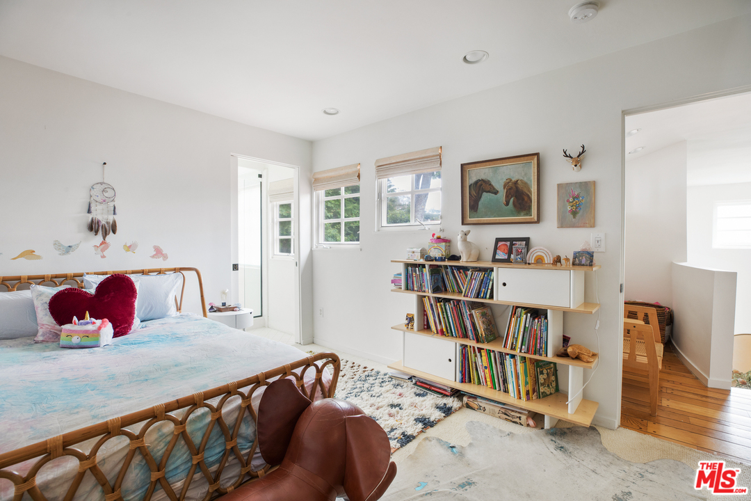 558 East Channel Road Santa Monica, CA 90402 - Photo 18 of 34 a bedroom with a bed and closet