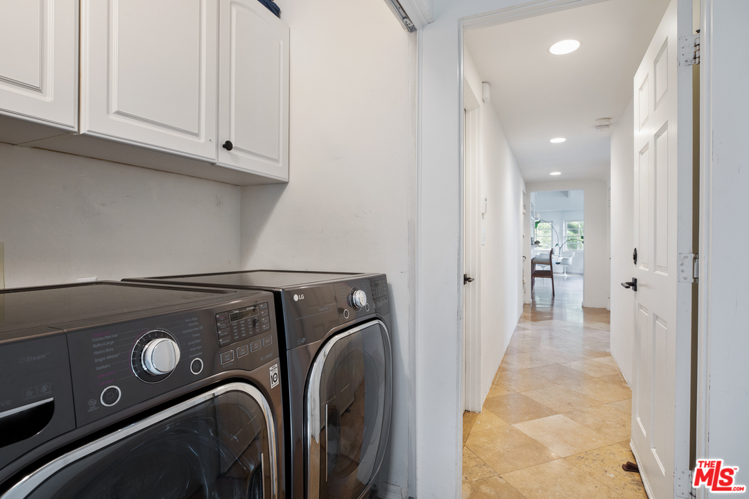 558 East Channel Road Santa Monica, CA 90402 - Photo 26 of 34 a view of storage and utility room with washer and dryer