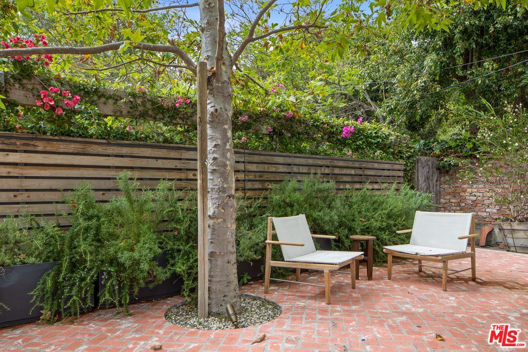 558 East Channel Road Santa Monica, CA 90402 - Photo 3 of 34 a view of a bench in the backyard
