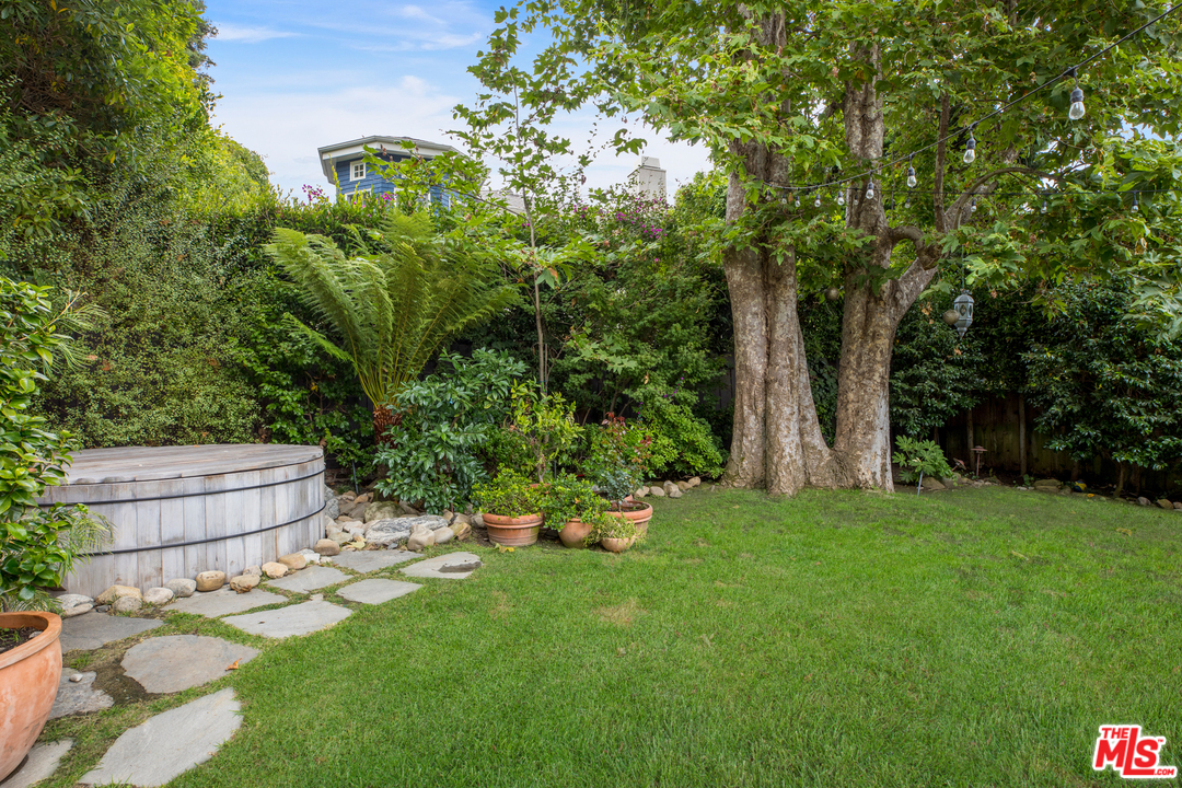 558 East Channel Road Santa Monica, CA 90402 - Photo 33 of 34 a garden with trees in the background