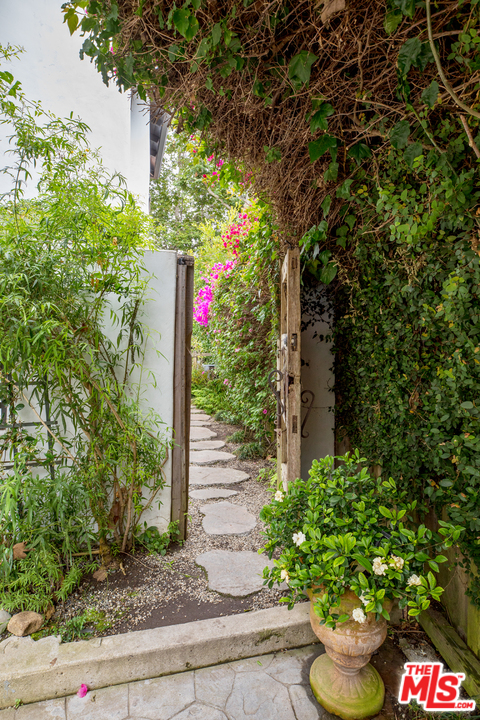 558 East Channel Road Santa Monica, CA 90402 - Photo 34 of 34 a sign that is sitting in front of flowers