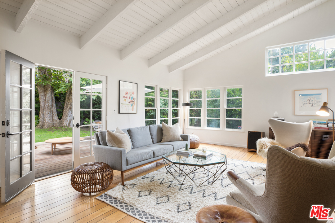 558 East Channel Road Santa Monica, CA 90402 - Photo 10 of 34 a living room with furniture and a large window